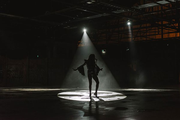 A dancer in an empty room